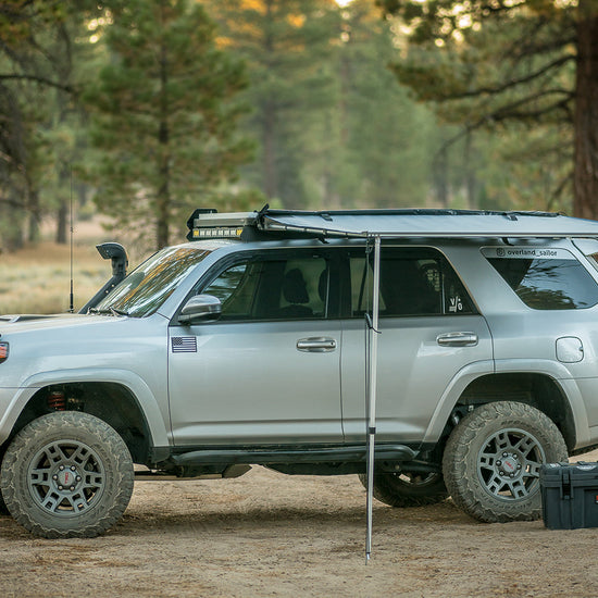 ROAM Adventure Co. Rooftop Awning connected to roof rails of a Toyota 4Runner