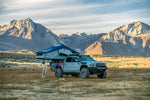 Vagabond Rooftop Tent in Slate Grey Navy Blue with ladder on a Toyota Tacoma